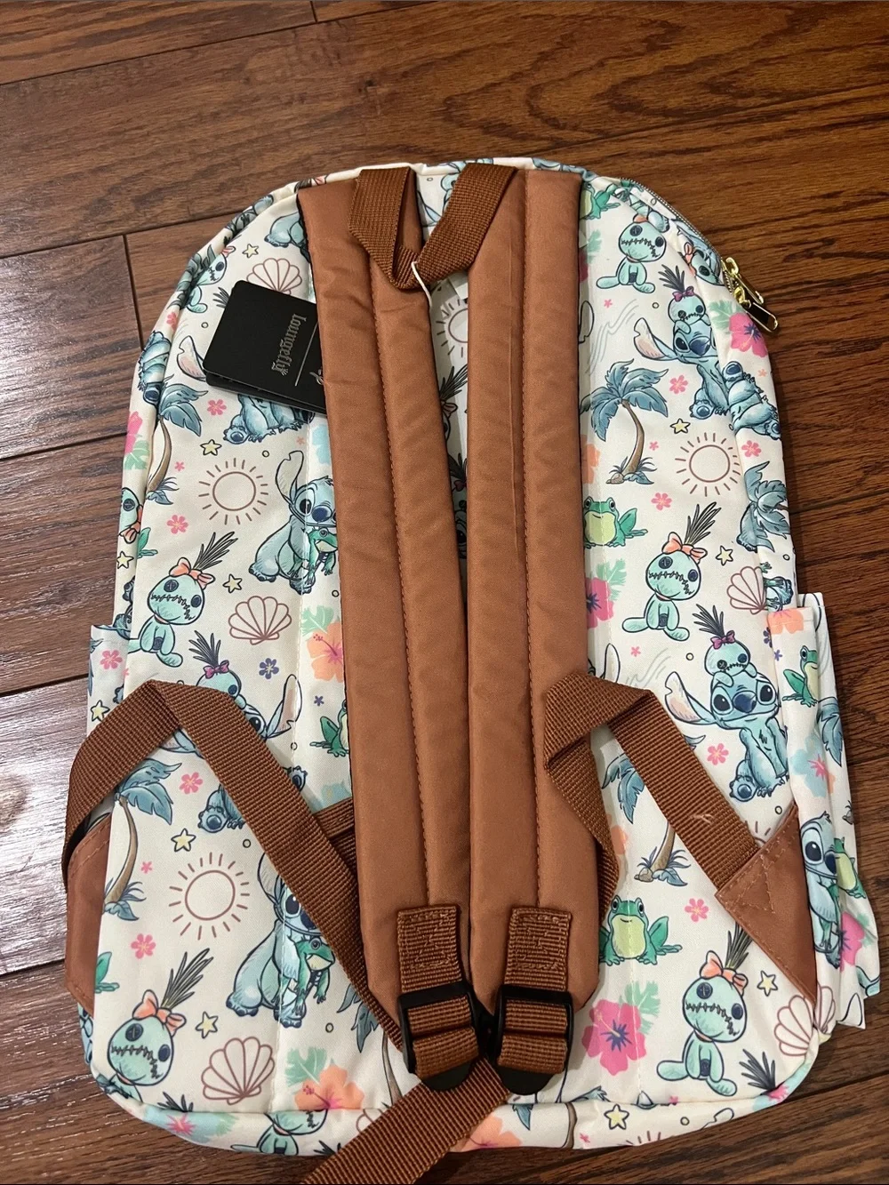 Disney Loungefly Cream Backpack with Aqua Stitch & Green Frog Print